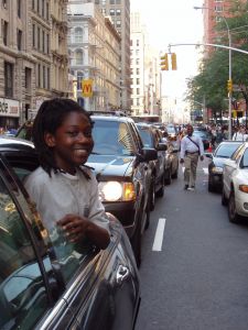 466137_boy_hanging_out_car_window.jpg